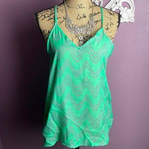 Brand new w tags! Peach love tank top size M and S! Beautiful Green Top!